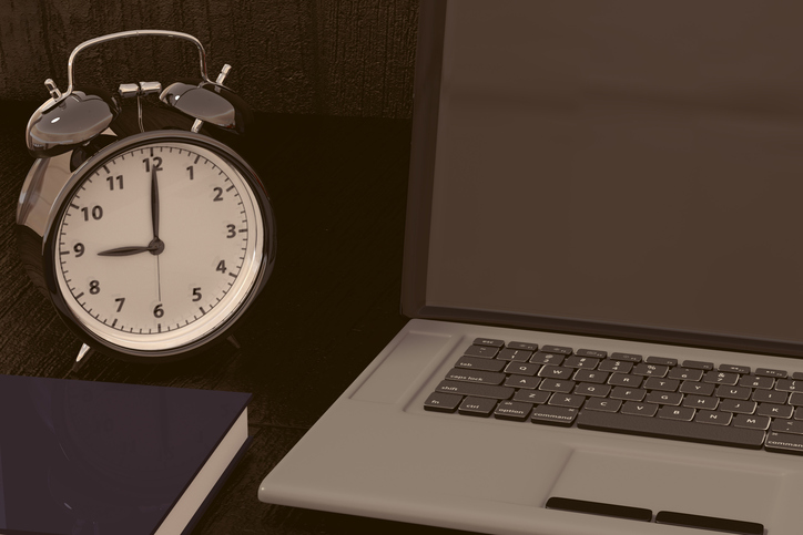 3D rendering of a clock, laptop and book for studies for works with time efficiency