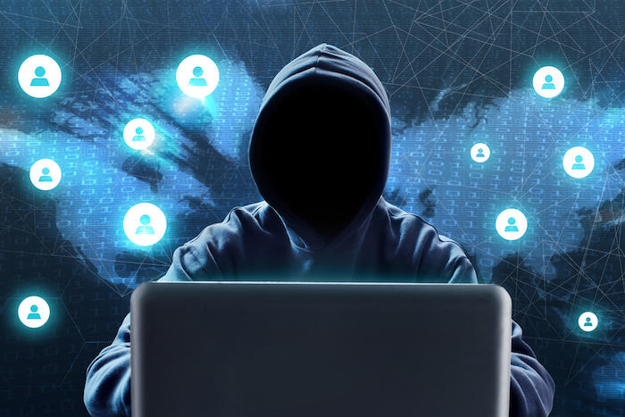 Hacker using laptop