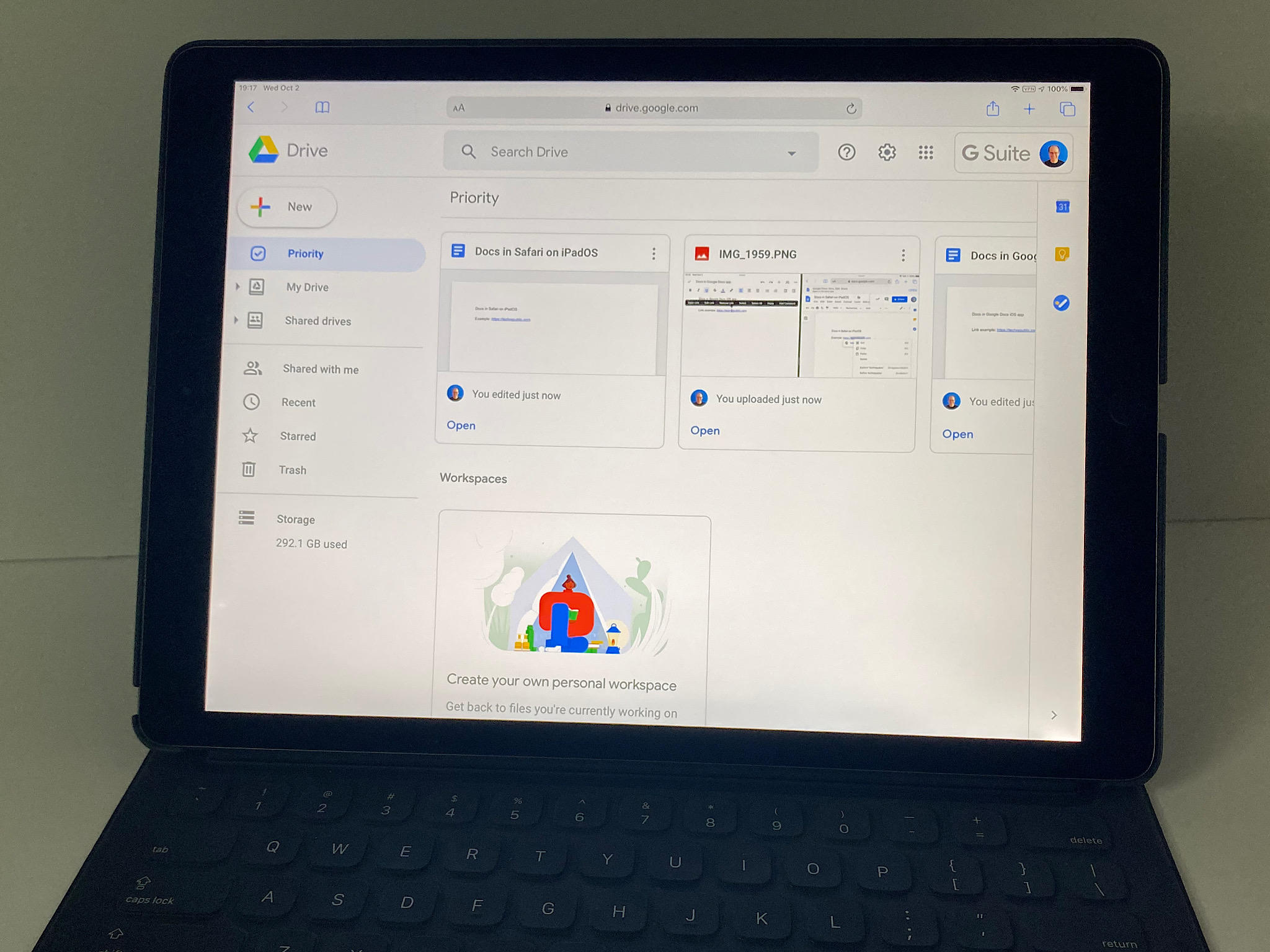 Photo of iPad 12.9" 2017 with Smart Keyboard attached, display shows Google Drive in Safari on iPadOS.