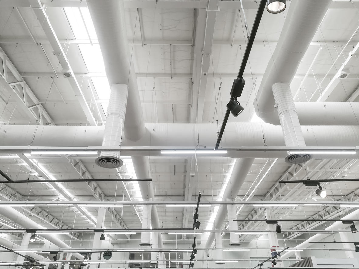 Pipeline and lighting above the ceiling of supermarket store