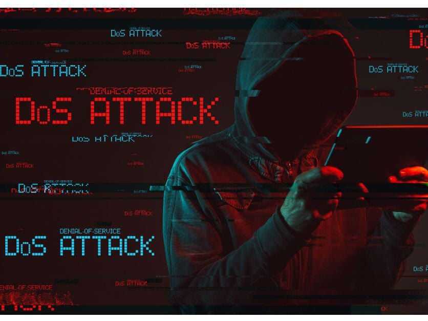 A hacker performing a DDoS attack.