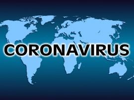 blue world map with black inscription coronavirus concept