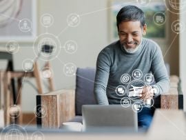 Asian or Hispanic man using Laptop and credit card payment shopping online with icon customer network connection on screen and connecting with omni channel system. Older man satisfied with CRM system