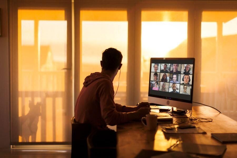 man-working-from-home-remote-work-sunset.jpg
