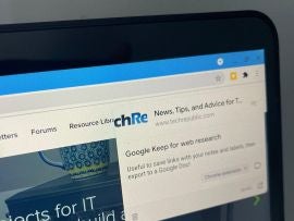 Photo of Chromebook, with Google Keep Chrome Extension having just been selected on the TechRepublic.com home page, with a note open and text entered "Useful to save links with your notes and labels, then export to a Google Doc."