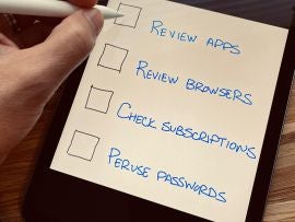 Photo of a left hand with an Apple pencil poised over an iPad mini with an on-screen checklist: Review apps, Review browsers, Check subscriptions, Peruse passwords