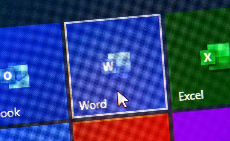 Microsoft Word and Excel app on the display notebook closeup. Microsoft Office is an office suite of applications created by Microsoft.