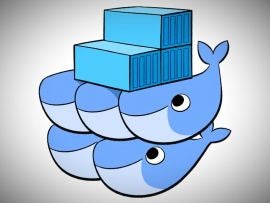 The logo of Docker Swarm. Five whales with three containers on thier backss.
