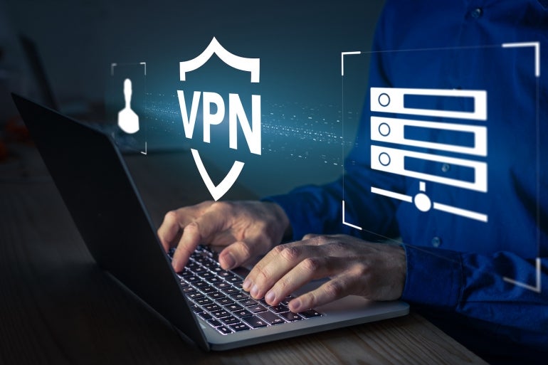 VPN secure connection concept. Person using Virtual Private Network technology on laptop computer to create encrypted tunnel to remote server on internet to protect data privacy or bypass censorship