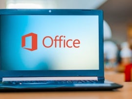 Laptop computer displaying logo of Microsoft Office.