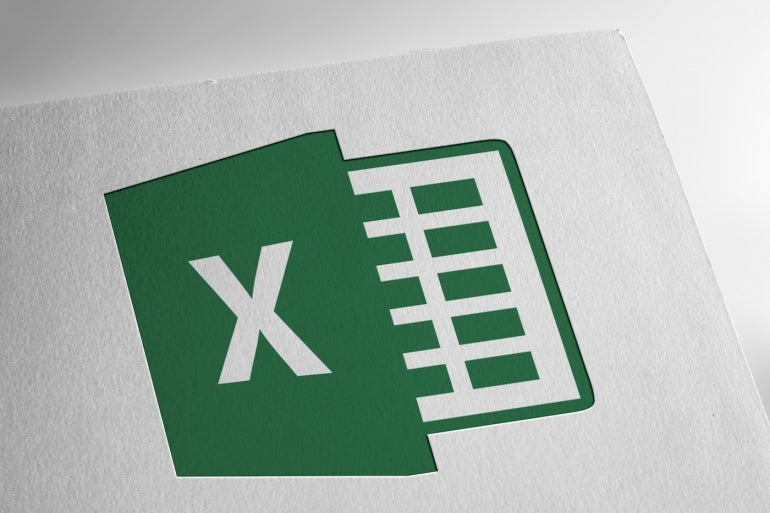 Microsoft Excel logo on textured paper.