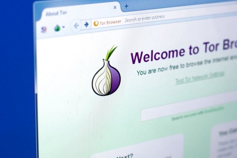 Tor browser on a display of PC with logo in a form of onion.