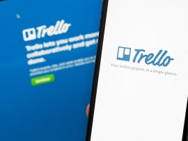 Trello logo app on the screen smartphone and notebook closeup. Trello is a cloud-based project management software for small teams. Moscow, Russia - July 28, 2020