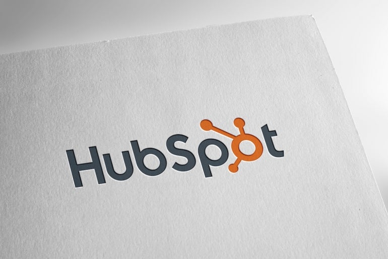 HubSpot logo on textured paper