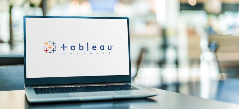 Laptop computer displaying logo of Tableau Software