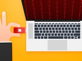 illustration of someone putting an infected usb into a laptop and infecting the laptop