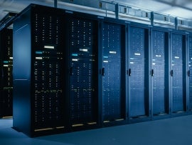 Shot of Data Center With Multiple Rows of Fully Operational Server Racks. Modern Telecommunications, Cloud Computing, Artificial Intelligence, Database, Super Computer Technology Concept.