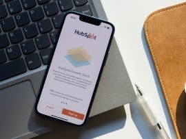 HubSpot mobile app login page is seen on an iPhone. HubSpot offers a full platform of marketing, sales, customer service, and CRM software.