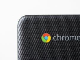 Portland, OR, USA - Feb 4, 2021: Closeup of the Google Chrome logo seen on a Samsung Chromebook 500c isolated on white.