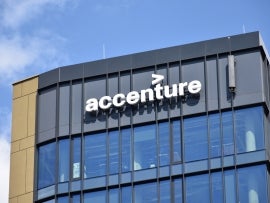 Accenture logo on the facade of multinational business management consultant company. WARSAW, POLAND - MAY 31, 2021