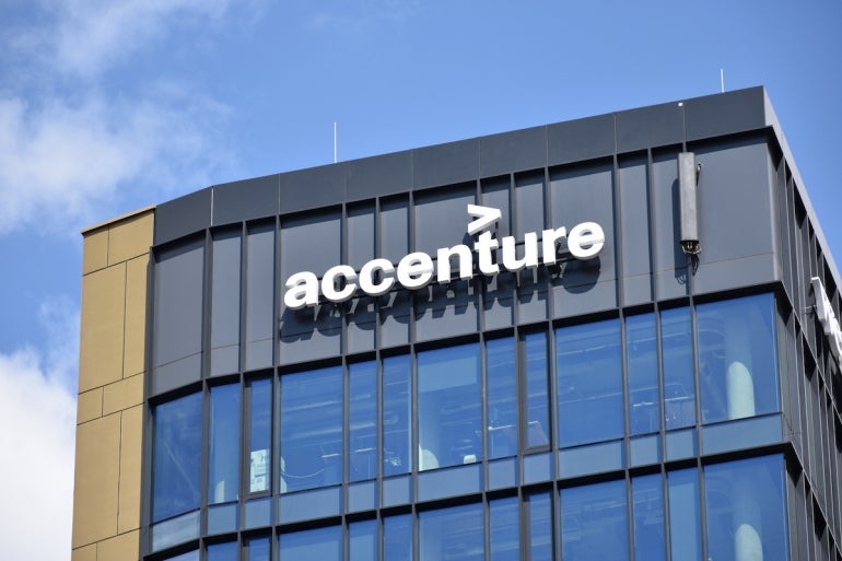 Accenture logo on the facade of multinational business management consultant company. WARSAW, POLAND - MAY 31, 2021