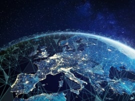 Telecommunication network above Europe viewed from space with connected system for European 5g LTE mobile web, global WiFi connection, Internet of Things (IoT) technology or blockchain fintech.