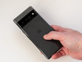 Google Pixel 6 Pro - High Tech Smartphone, showing rear camera and case and box