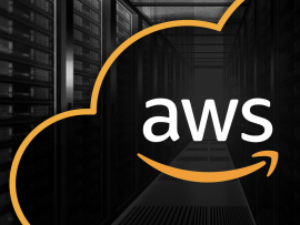 The Amazon Web Services logo in front of a server room.