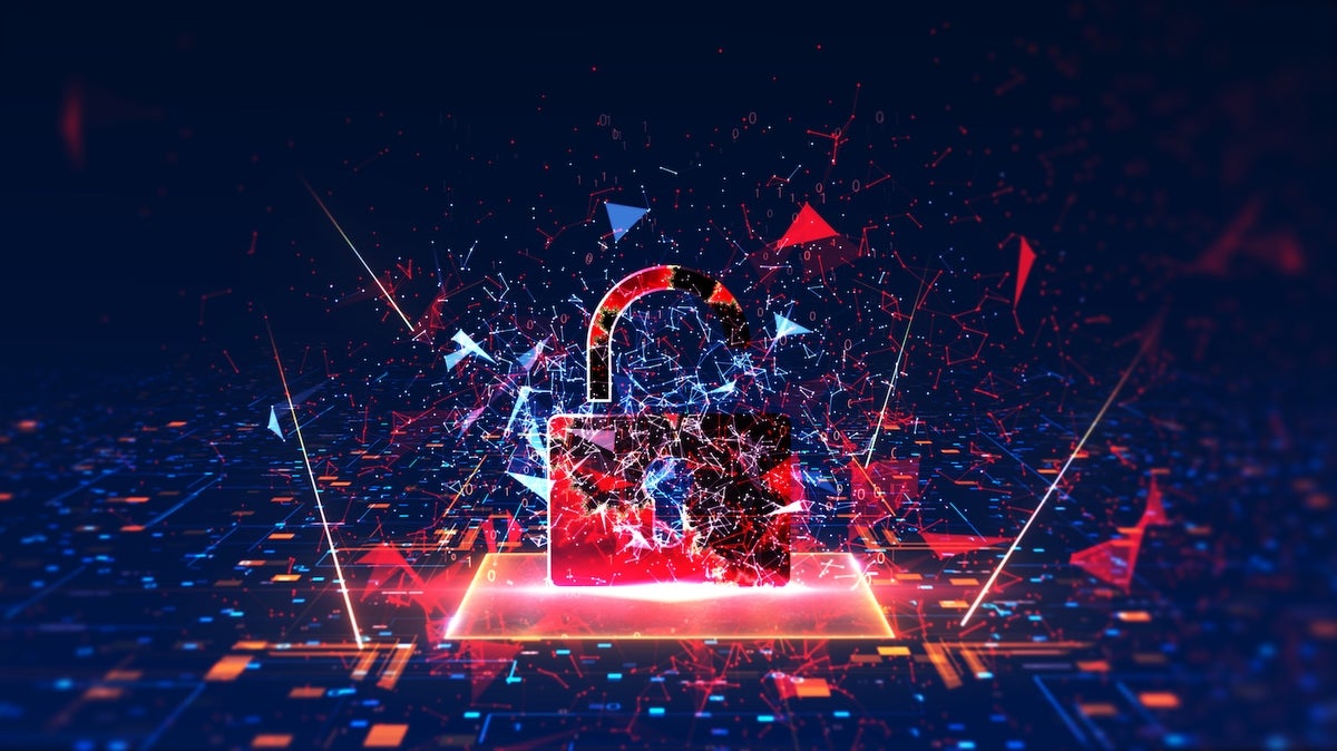 A red lock representing cybersecurity is being destroyed.