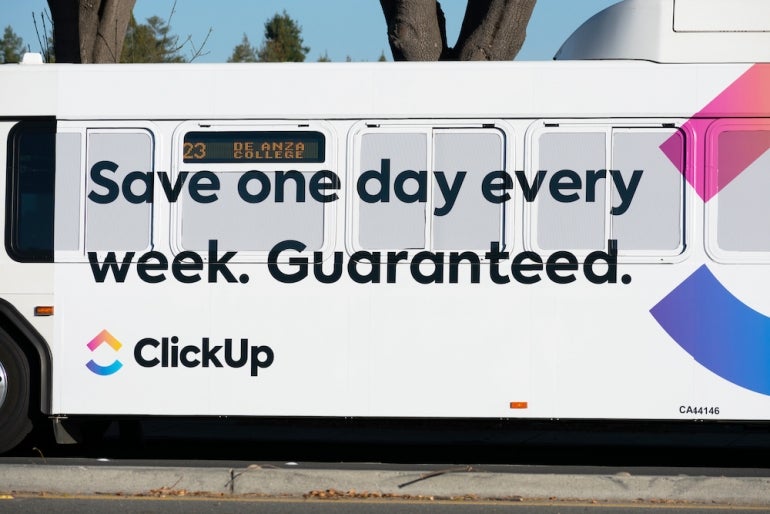 ClickUp advertisement on the bus exterior is building brand awareness. ClickUp is a customizable productivity platform - San Jose, California, USA - 2020