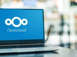 Laptop computer displaying logo of Nextcloud.