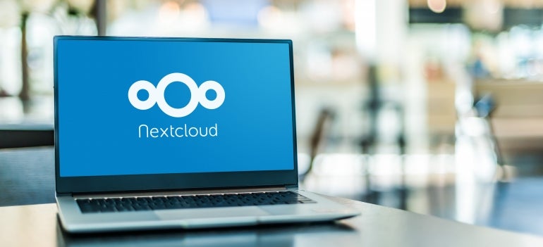Laptop computer displaying logo of Nextcloud.