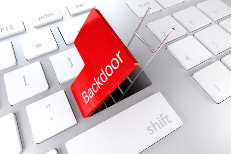 A keyboard with a cyber attack coming through a key that says backdoor.