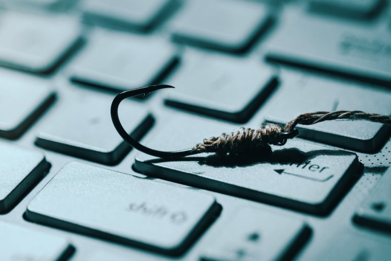 A hook on a keyboard representing phishing.