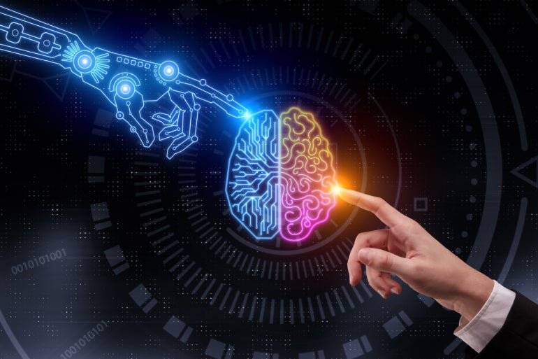 An AI hand and a businessman's hand touch a brain.