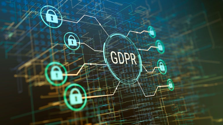The word GDPR and data protection symbols on an abstract background.