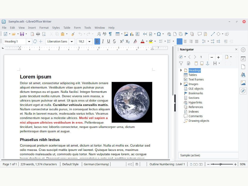 LibreOffice Writer interface with Lorem ipsum filler text typed on the page next to a photo of the Earth