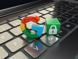 The Google log and a security symbol on a keyboard.
