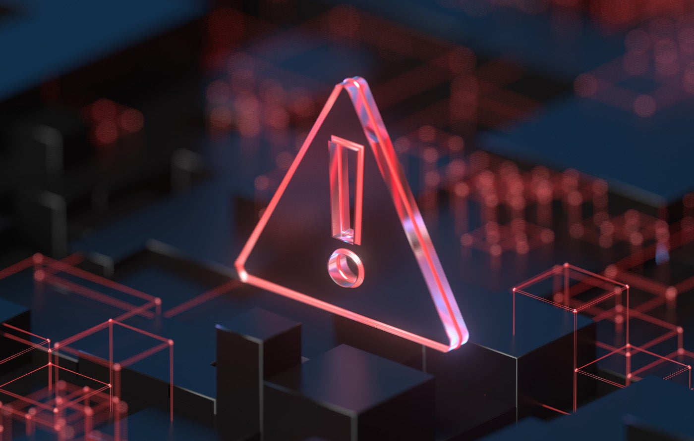 A 3D rendering of a red warning sign hovering in a sea of black cubes.
