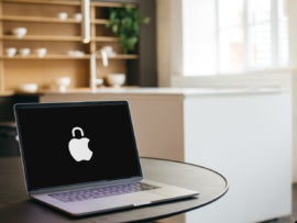 Apple laptop with Privacy logo.