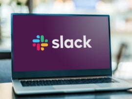 Laptop computer displaying logo of Slack.