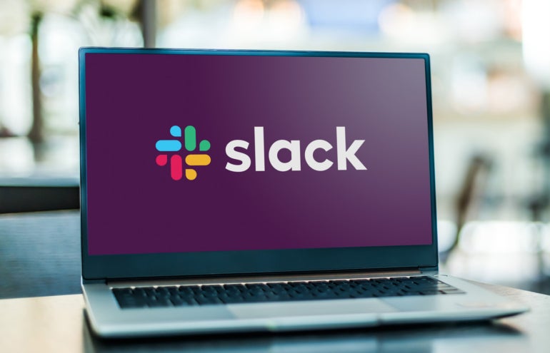 Laptop computer displaying logo of Slack.