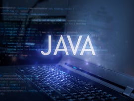 Java inscription against laptop and code background.