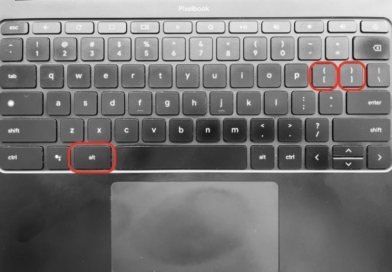 Chromebook keypad with alt key and left and right square bracket keys on highlight.